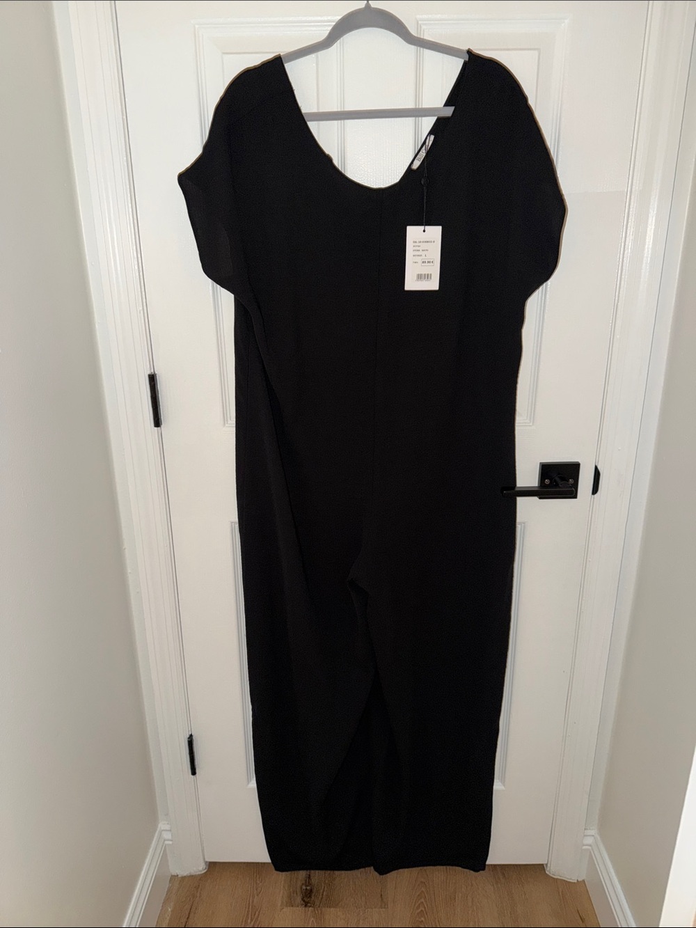 Black Scoop-Neck Jumpsuit - Minimal Chic